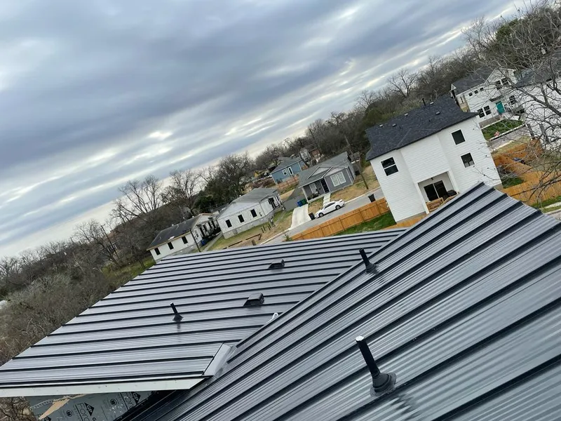 Standing seam metal roof panels with vents for Skylight Repair in Cedar Hills